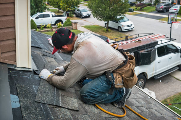Professional Gutter Repair And Installation technician working in Washington, MI